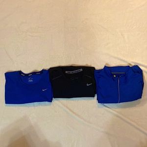 1 nike dry fit-tee, 1 blue zip up lightweight jacket,1 nike black long sleeve